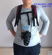 Backpack camera mounted with camera decompression strap can hang on a SLR camera fast - tape shooter