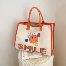 Large capacity mommy bag summer portable canvas bag 2021 new fashion Korean printed mother and baby bag lunch bag tide