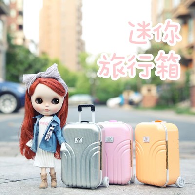 taobao agent Small suitcase, doll