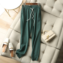 Comfortable easy to wear and decent two-color optional drawstring elastic waist pants open fork design nine sports pants women autumn