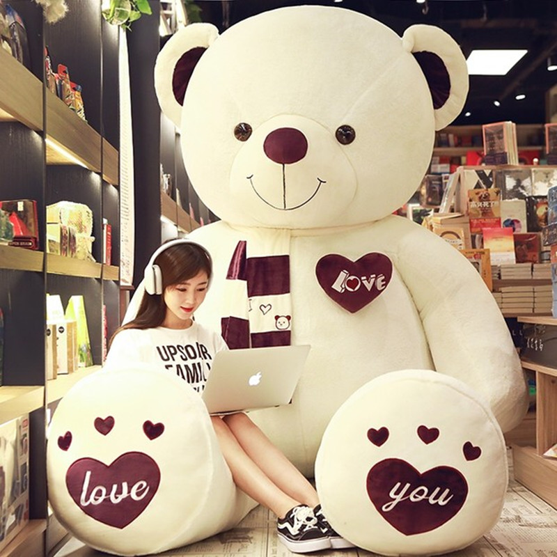 Girls are given gifts by giant bear plush toy panda dolls and cuddly large toy bears
