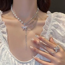 Ожерелье из жемчуга и бабочки Women 2023 Новый легкий роскошь Кольцо из взрывчатки Высокий дизайн Цепочка из кости