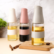 Gravity induction oil bottle household soy sauce vinegar seasoning bottle glass without oil tank kitchen automatic opening and closing oil pot