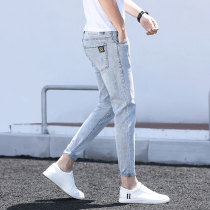 Light-colored ice silk jeans mens 2021 new summer Korean version thin slim small feet stretch mens nine-point pants