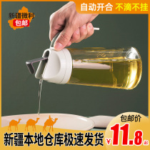 Xinjiang kitchen large-capacity glass dust-proof and leak-proof oil pot automatic opening lid flip oil bottle liquid seasoning bottle