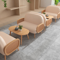 Nordic rattan double sofa Net Red simple designer ins cafe milk tea shop solid wood table and chair combination