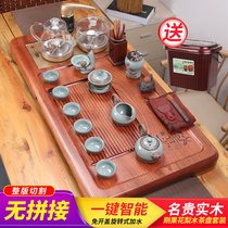 Whole solid wood tea tray Four-in-one pear tea set Induction cooker automatic one-in-one household simple tea sea