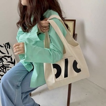 Original niche design art letters white Japanese Korean style ins large capacity canvas bag one shoulder womens summer