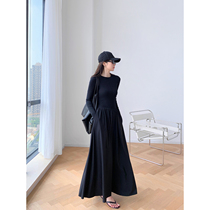 SUK High Cold Supremacy! Knitted panels with a flowing hem reveal a slim low-rise long-sleeved dress