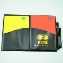 Red and yellow cards Red and yellow cards Football referee with fluorescent red and yellow cards with pen Record book set