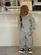 Boys spring clothing suit 2022 new foreign air children Huafg sports necropolis Fried Street Handsome Qi-tide childrens clothes