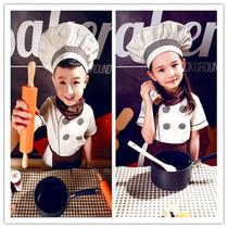 Childrens chefs suit the boysgirls acting out of the bakers small chefs role-playing performance