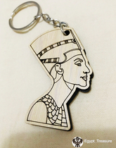 A small amount of ancient Egyptian Queen Nefertiti wooden key ring pendant