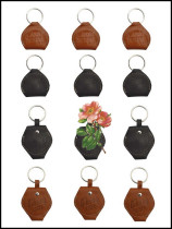 Factory price direct sale keychain type leather paddle bag set exquisite gift