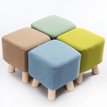 Small wooden stool for changing shoes
