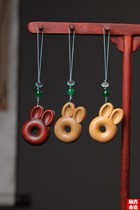 Purple sandalwood Barbie Honolulu carved rabbit doughnut mobile phone package pendant decoration cute