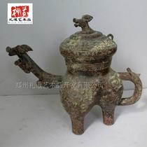 Do the old imitation ancient bronze ware handicraft large all different period The wine pot bronze ware shows the spring and autumn beast face grain dragon flow.