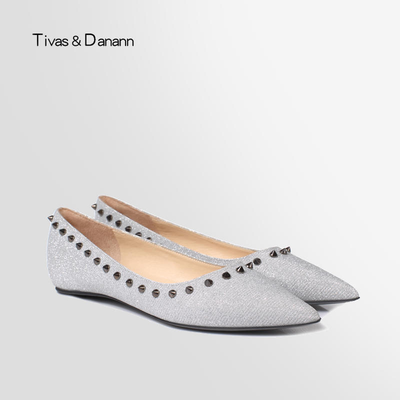 Rivet pointed flat sole shoes spring and summer 2019 new style European and American fashion women's shoes shallow silver single shoes