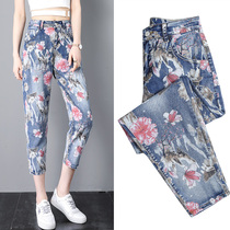 European and American printed jeans womens summer new elastic display slim 80% Harun pants loose casual high waist flower pants