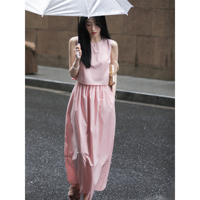 taobao agent Xia Shiwen Summer Tulip Simple Straight Korean Sleeveless Circular Top/Cocoon Skirt Set Woman