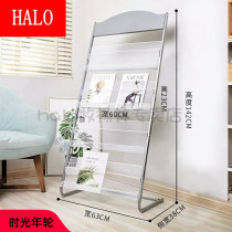 MAGAZINE SHELF PROMOTIONAL MATERIAL SHELF DISPLAY SHELF BOOK NEWSPAPER SHELF A SINGLE PAGE COLORFUL PAGE CONTAINING THE FLOOR NEWSPAPER PRESS SHELF