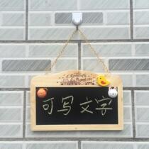 The owner of the wooden card has something to go out the sign is listed the house number is warm the diy bar at the door is open and the phone number is written.