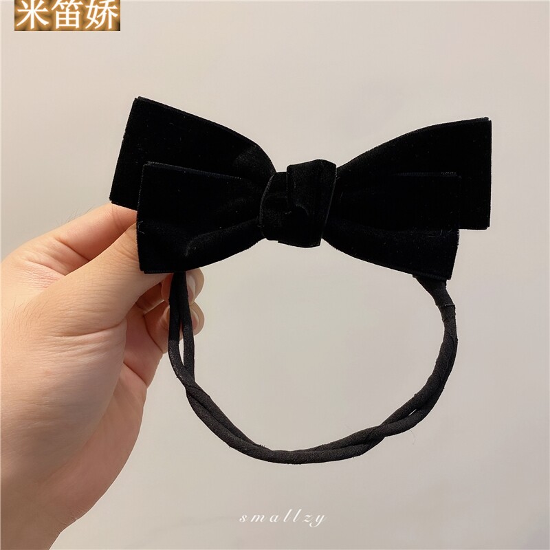 South Koreas autumn winter pill head disc hair machine net red lazy retro temperament velvet bow hair shape god girl