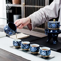 Shiliju complete set of blue and white porcelain automatic Kung Fu tea set Household anti-scalding stone grinding tea maker Ceramic teapot