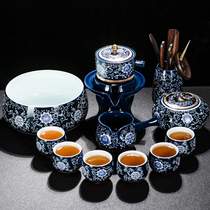 A complete set of blue and white porcelain automatic kung fu tea set for household lazy anti-hot stone mill tea maker ceramic teapot