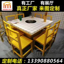 There is a head marble hot pot table induction cooker integrated string of fragrant wood market hot pot restaurant table and chair restaurant