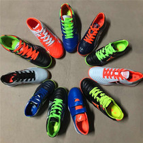 Foreign trade single childrens boys and girls professional broken nails football shoes in the big children competition training shoes artificial grass cut shoes