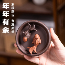Zisha tea pet has fish and cattle turn to Qiankun tea plate ornaments can raise creative fish tea to play with the year of the Ox