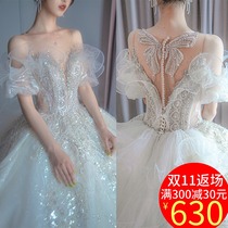 One-word shoulder main wedding dress bride 2021 new big tailing small woman French heavy industry light court winter