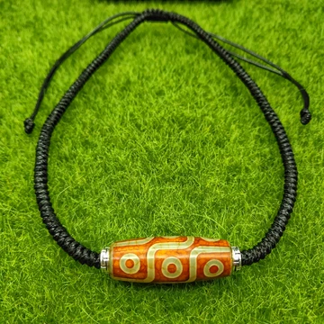 上肯天珠 5A牙黄九眼天珠 55mmX12mm 上肯天珠 5A牙黄九眼天珠 55mmX12mm