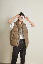 Fluffy warm light luxury minimalist earth brown leather down vest female thick stand collar sheepskin coat winter
