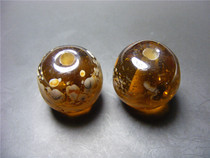 A0702 decades of amber-colored twisted glazed Dalezi beads 2 shots together