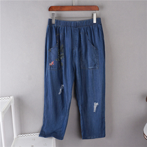 64402 summer new female loose slim fashion print hole leisure comfort Tencel denim Capri pants 1111