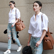 21 early Spring New Song Jia star same Korean version loose OL professional design sense niche white shirt female wild