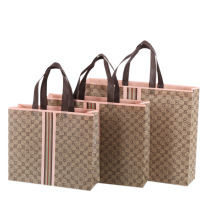 High-grade non-woven Film Film gift bags men and women clothing stores hand-held shopping bags spot custom printed LOGO store name